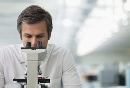 Manadatory Credit: Photo by OJO Images / Rex Features (1482483a)MODEL RELEASED Scientist using microscope in labVARIOUS/Rex_PEEP7YY_1482483A//1111152345